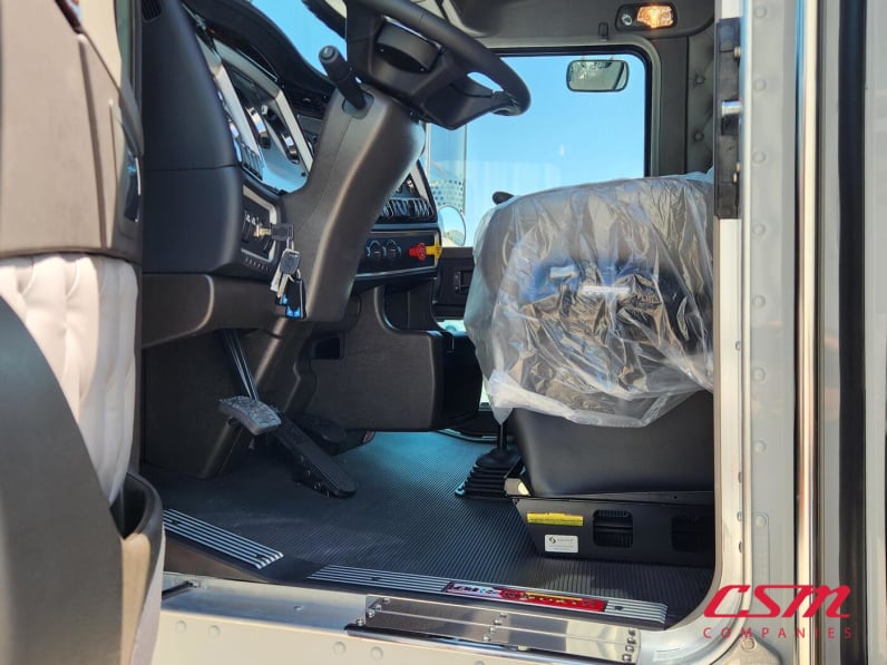 Drivers side door open for this 2026 Kenworth W900L (Stock number: TR216633)