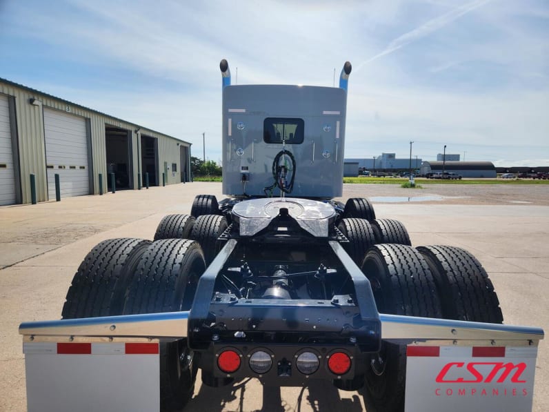 Exterior full rear view for this 2026 Kenworth W900L (Stock number: TR216633)