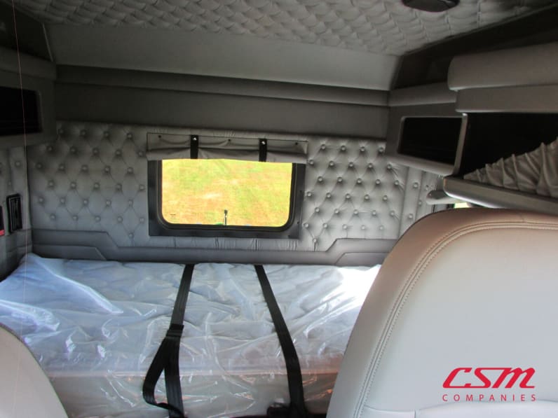 Interior wide sleeper view for this 2026 Kenworth W900L (Stock number: TR218306)