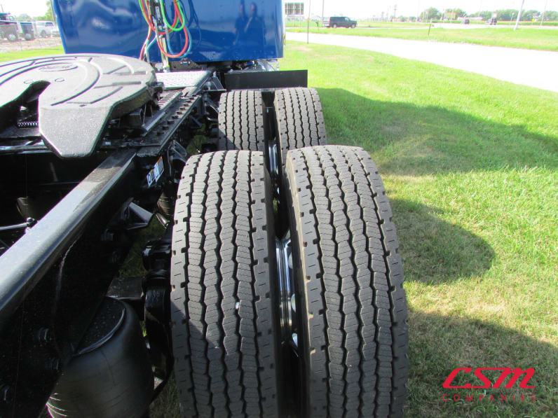 Passenger side rear frame and tire tread for this 2026 Kenworth W900L (Stock number: TR218306)
