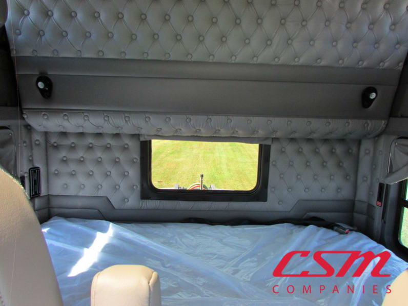 Interior wide sleeper view for this 2026 Kenworth W900L (Stock number: TR218307)