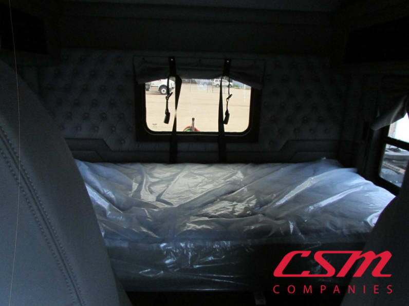 Interior wide sleeper view for this 2026 Kenworth W900L (Stock number: TR224556)