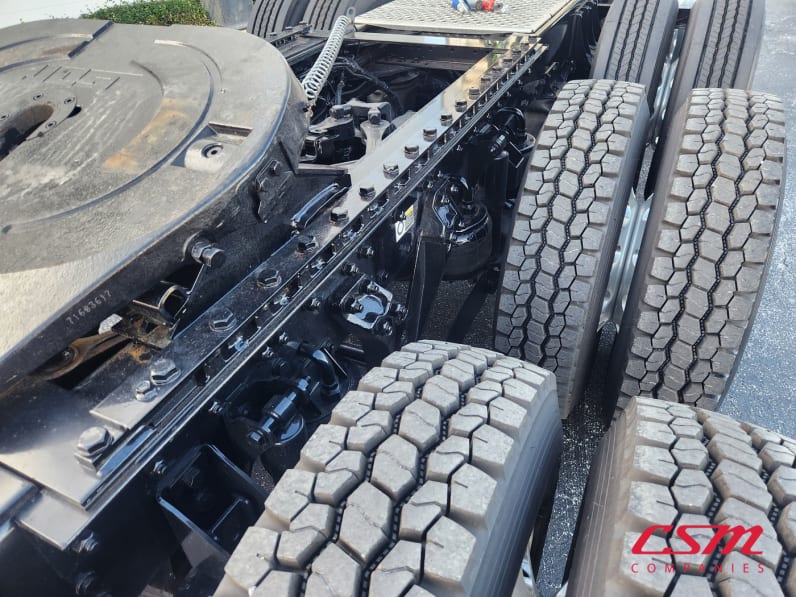 Passenger side rear frame and tire tread for this 2026 Kenworth W900L (Stock number: TR224693)
