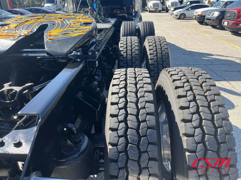 Passenger side rear frame and tire tread for this 2026 Kenworth W900L (Stock number: TR224699)