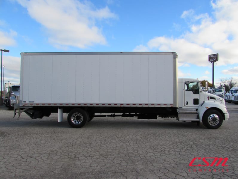 Exterior full passenger side for this 2019 Kenworth T370 (Stock number: UKM252038)