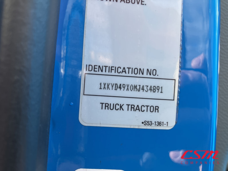 VIN tag for this 2021 Kenworth T680 (Stock number: UMJ434891A)