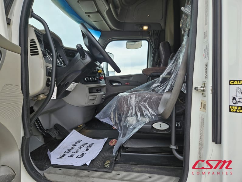 Drivers side door open for this 2022 Peterbilt 579 (Stock number: UND759970)