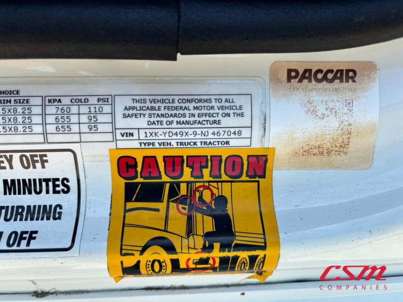 VIN tag for this 2022 Kenworth T680 (Stock number: UNJ467048)