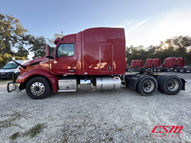 Exterior full driver side for this 2023 Peterbilt 579 (Stock number: UPD806284)Weeee