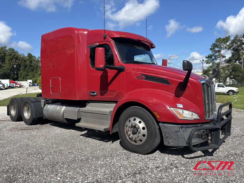 Exterior front passenger side for this 2023 Peterbilt 579 (Stock number: UPD806297)Weeee