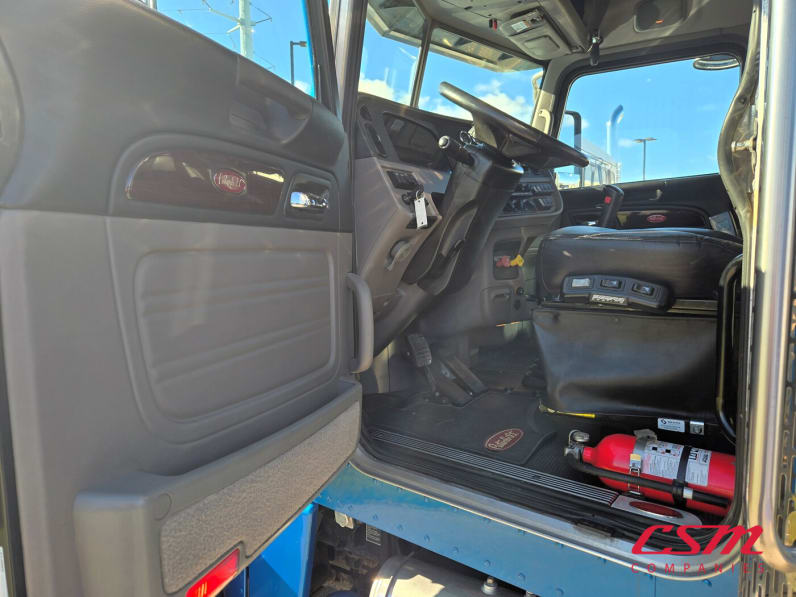 Drivers side door open for this 2023 Peterbilt 389 (Stock number: UPD816047)