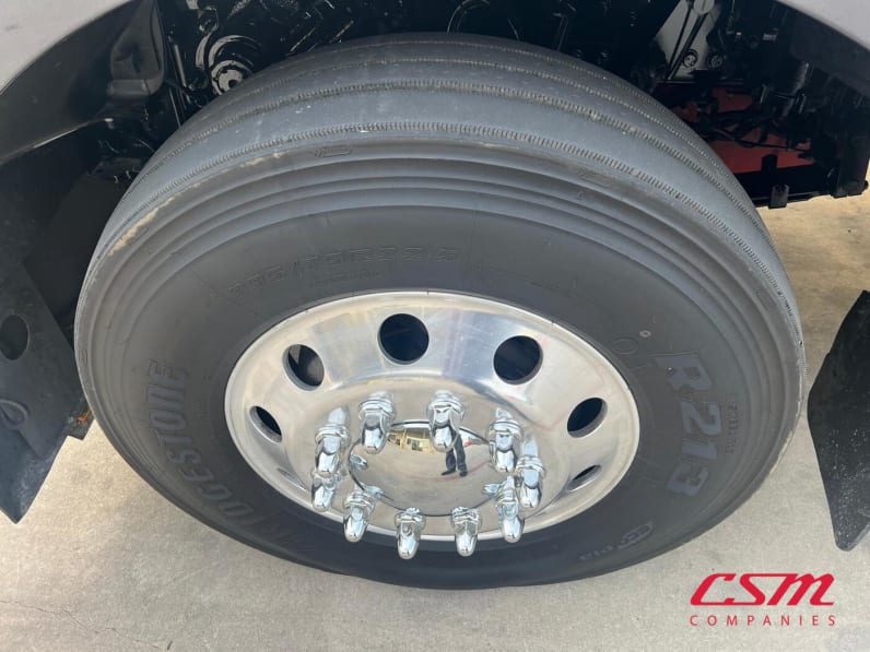 Driver side front tire tread for this 2023 Kenworth W990 (Stock number: UPJ220957)