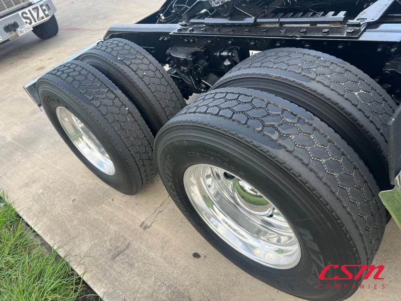 Driver side rear frame and tire tread for this 2023 Kenworth W990 (Stock number: UPJ220957)