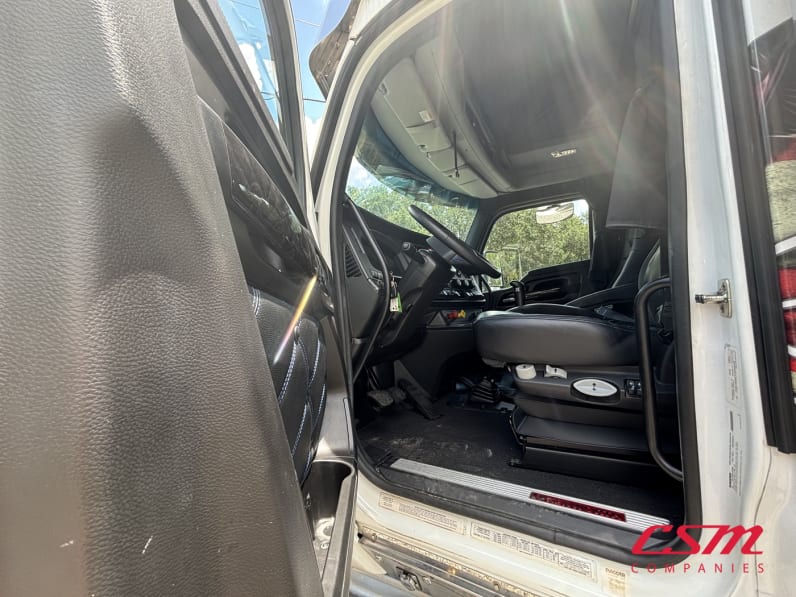 Drivers side door open for this 2023 Kenworth W990 (Stock number: UPJ220959)