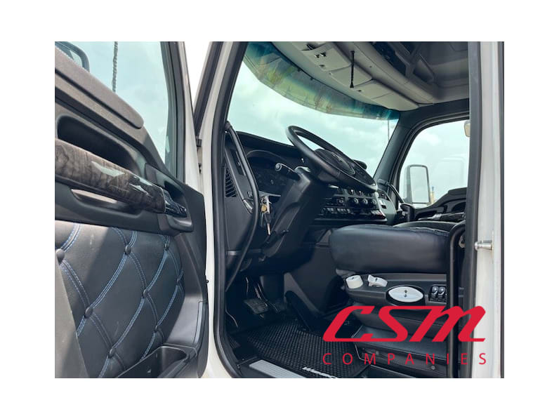 Drivers side door open for this 2023 Kenworth W990 (Stock number: UPJ220961)