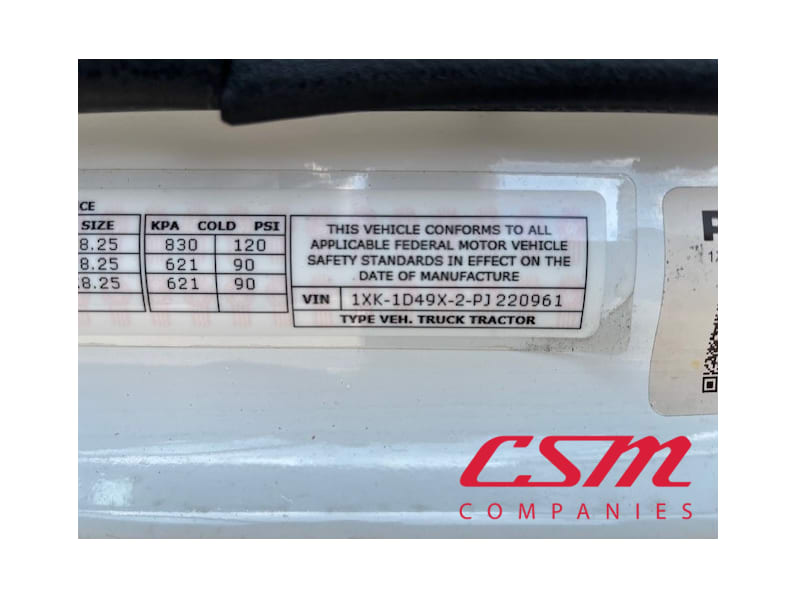 VIN tag for this 2023 Kenworth W990 (Stock number: UPJ220961)