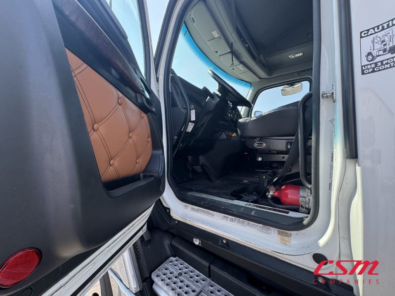Drivers side door open for this 2023 Kenworth T680 (Stock number: UPJ231782)