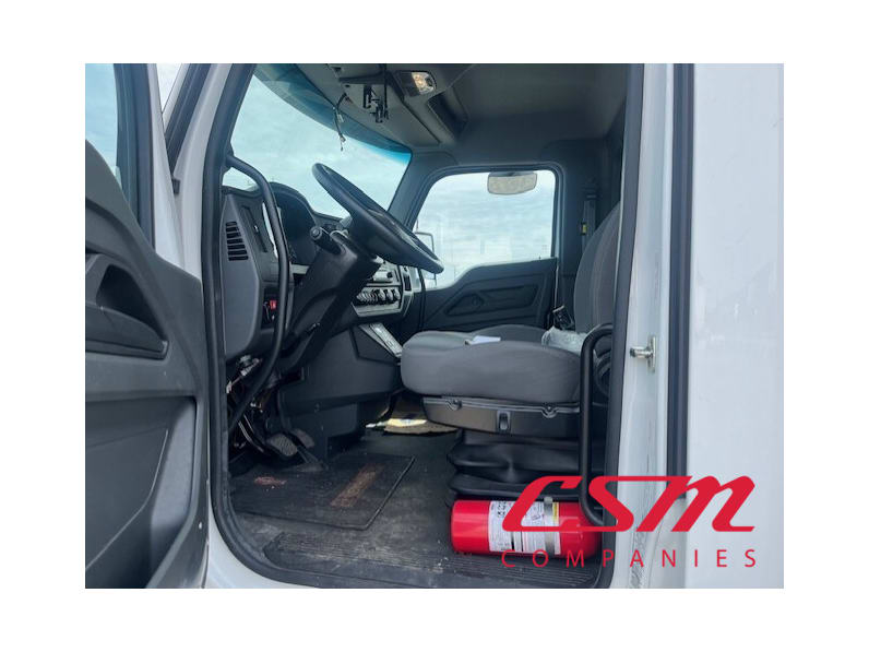 Drivers side door open for this 2023 Kenworth T280 (Stock number: UPM252172)