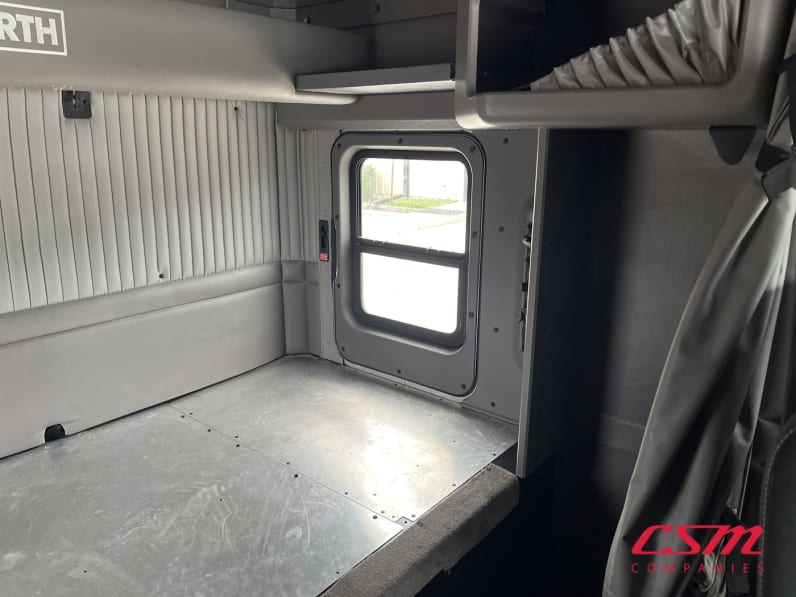 Interior driver side sleeper for this 2023 Kenworth W900L (Stock number: UPR256936)