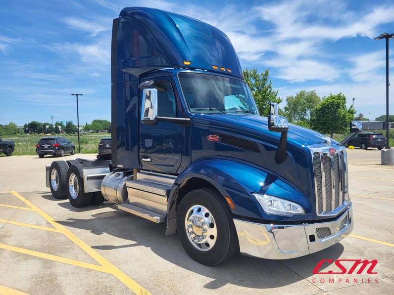Exterior front passenger side for this 2025 Peterbilt 579 (Stock number: USD739466)Weeee