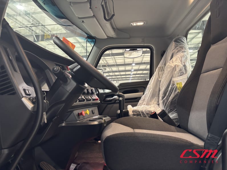 Drivers side door open for this 2027 Kenworth T880S (Stock number: VJ228893)