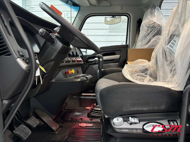 Drivers side door open for this 2027 Kenworth T880 (Stock number: VJ241555)Weeee