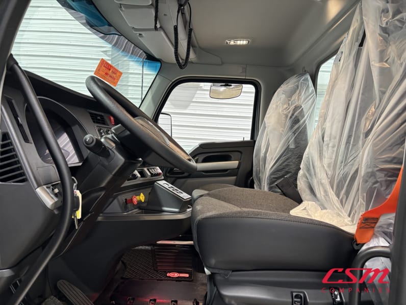 Drivers side door open for this 2027 Kenworth T880 (Stock number: VJ243552)Weeee