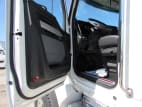 Drivers side door open for this 2024 Kenworth T880 (Stock number: RJ371262)
