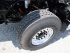 Driver side front tire tread for this 2025 Kenworth T880 Short Hood (Stock number: SJ173928)