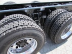 Passenger side rear frame and tire tread for this 2025 Kenworth T880 Short Hood (Stock number: SJ173928)