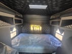 Interior wide sleeper view for this 2025 Kenworth W900L (Stock number: SR177262)