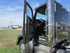 Drivers side door open for this 2026 Kenworth T880 (Stock number: TF219863)