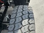 Driver side front tire tread for this 2026 Kenworth T880 (Stock number: TF219872)