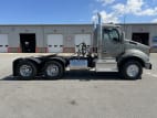 Exterior full passenger side for this 2026 Kenworth T880 (Stock number: TF219872)