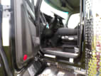 Drivers side door open for this 2026 Kenworth T880 Short Hood (Stock number: TJ206864)