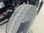 Driver side front tire tread for this 2026 Kenworth T880 (Stock number: TJ208414)