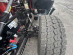 Driver side front tire tread for this 2026 Kenworth T880 (Stock number: TJ208422)