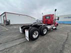 Exterior rear passenger side for this 2026 Kenworth T880 (Stock number: TJ208423)