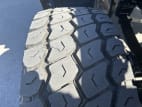 Passenger side front tire tread for this 2026 Kenworth T880 (Stock number: TJ210605)