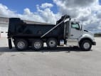 Exterior full passenger side for this 2026 Kenworth T880 (Stock number: TJ211060)