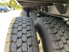 Driver side rear frame and tire tread for this 2026 Kenworth T880 (Stock number: TJ211549)