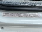 VIN tag for this 2026 Kenworth T880 (Stock number: TJ212210)