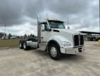 Exterior front passenger side for this 2026 Kenworth T880 (Stock number: TJ212212)