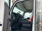 Drivers side door open for this 2026 Kenworth T880 (Stock number: TJ216007)