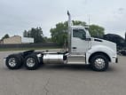 Exterior full passenger side for this 2026 Kenworth T880 Short Hood (Stock number: TJ216227)