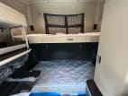Interior wide sleeper view for this 2026 Kenworth T680 (Stock number: TJ219234)
