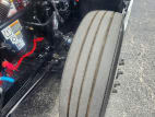 Driver side front tire tread for this 2026 Kenworth T680 (Stock number: TJ219912)
