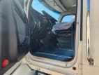 Drivers side door open for this 2026 Kenworth T880 (Stock number: TJ220136)