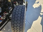 Driver side front tire tread for this 2026 Kenworth T880 (Stock number: TJ228296)