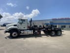 Exterior full driver side for this 2026 Mack Granite GR64 (Stock number: TM051005)
